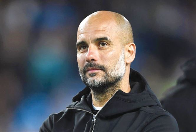 Pep Guardiola nổi tiếng với sơ đồ 4-3-3 undefined